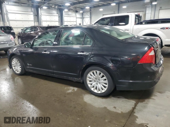 2012 Ford Fusion Hybrid с VIN 3FADP0L33CR231536, выставлен на аукционе Copart как лот 55330545 с пробегом 165 481 миль миль и Списание • Salvage title. История ставок и продаж доступна на DreamBid. Изображение 2.