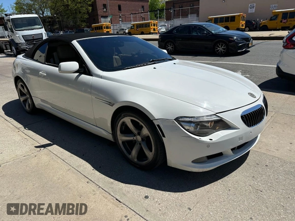 2009 BMW 6 Series 650i z VIN WBAEB53599C224302, wystawiony jako Copart lot #55150865 z przebiegiem 123 706 mil mil oraz Szkoda całkowita • Salvage title. Historia ofert i sprzedaży dostępna na DreamBid. Obrazek 2.