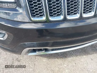 2014 Jeep Grand Cherokee Overland with VIN 1C4RJECG8EC417995, listed as a IAAI auction lot 41959550 with 155,029 mi miles. Bid and sale history available at carsss.com. Image 6.