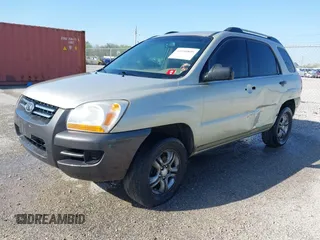 2006 Kia Sportage LX z VIN KNDJF723X67143301, wystawiony jako IAAI lot #41950899 z przebiegiem 271 184 mil mil oraz . Historia ofert i sprzedaży dostępna na DreamBid. Obrazek 2.
