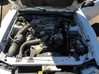 2000 Ford Mustang z VIN 1FAFP4447YF287507, wystawiony jako Copart lot #57669515 z przebiegiem 133 309 mil mil oraz Czysty tytuł • Clean title. Historia ofert i sprzedaży dostępna na DreamBid. Obrazek 11.