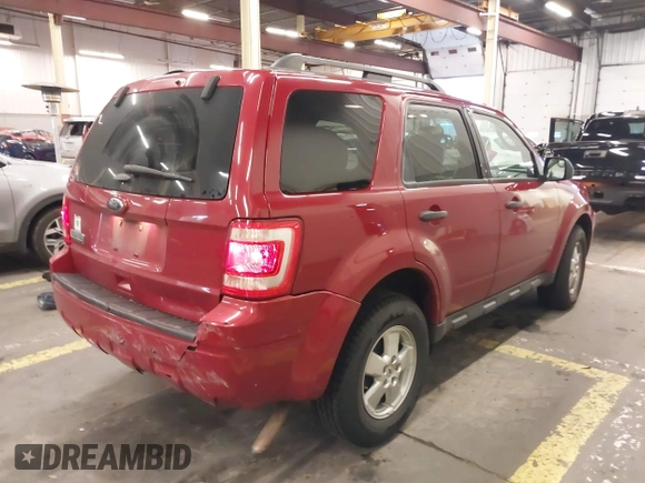 2011 Ford Escape XLT с VIN 1FMCU9D7XBKB14572, выставлен на аукционе IAAI как лот 40920474 с пробегом 154 888 миль миль и . История ставок и продаж доступна на DreamBid. Изображение 4.
