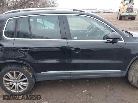 2016 Volkswagen Tiguan S with VIN WVGBV7AXXGW581315, listed as a IAAI auction lot 41495812 with 180,061 mi miles and . Bid and sale history available at DreamBid. Image 13.