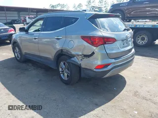 2017 Hyundai Santa Fe 2.4L z VIN 5NMZU3LB7HH025791, wystawiony jako IAAI lot #42277964 z przebiegiem 154 110 mil mil oraz . Historia ofert i sprzedaży dostępna na DreamBid. Obrazek 3.