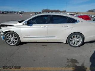 2014 Chevrolet Impala LTZ with VIN 1G1145SL4EU107932, listed as a IAAI auction lot 41685673 with 257,326 mi miles. Bid and sale history available at carsss.com. Image 14.