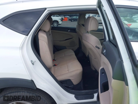 2017 Hyundai Tucson SE with VIN KM8J3CA44HU511581, listed as a IAAI auction lot 41687971 with 111,981 mi miles. Bid and sale history available at carsss.com. Image 8.