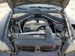 2012 BMW X5 35i with VIN 5UXZV4C54CL754852, listed as a Copart auction lot 62836055 with 108,627 mi miles and Clean title. Bid and sale history available at DreamBid. Image 12.