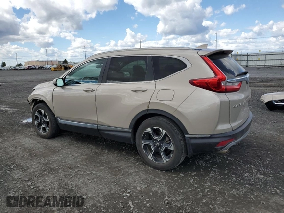 2018 Honda CR-V Touring with VIN 5J6RW2H98JL002657, listed as a Copart auction lot 55075965 with 61,327 mi miles and Salvage Title. Bid and sale history available at DreamBid. Image 2.