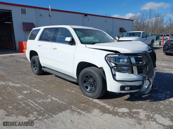 2020 Chevrolet Tahoe Commercial with VIN 1GNSKDEC2LR217697, listed as a IAAI auction lot 40815499 with 128,503 mi miles. Bid and sale history available at carsss.com. Image 1.
