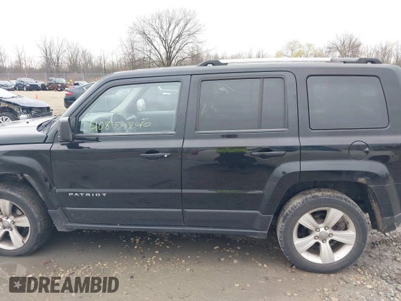 2014 Jeep Patriot Limited with VIN 1C4NJRCB7ED569805, listed as a IAAI auction lot 40854840 with 189,858 mi miles. Bid and sale history available at carsss.com. Image 14.