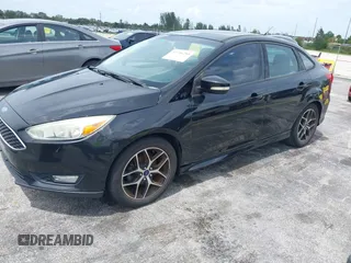 2015 Ford Focus SE with VIN 1FADP3F21FL209221, listed as a IAAI auction lot 42716293 with 100,465 mi miles and . Bid and sale history available at DreamBid. Image 2.