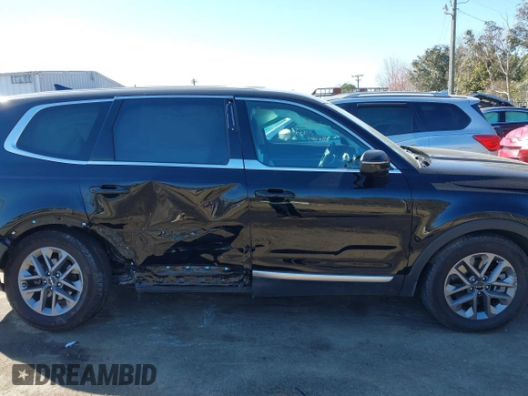 2023 Kia Telluride LX z VIN 5XYP2DGC2PG394637, wystawiony jako IAAI lot #41697582 z przebiegiem 19 836 mil mil oraz . Historia ofert i sprzedaży dostępna na DreamBid. Obrazek 13.