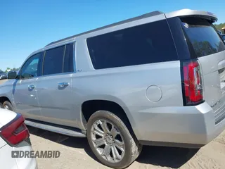 2015 GMC Yukon XL SLT with VIN 1GKS1HKC8FR221608, listed as a IAAI auction lot 42044318 with 215,757 mi miles. Bid and sale history available at carsss.com. Image 14.