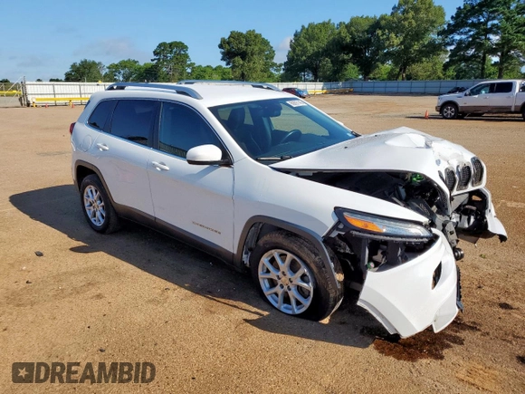 2016 Jeep Cherokee Latitude with VIN 1C4PJLCB8GW125748, listed as a Copart auction lot 60697145 with 118,276 mi miles and Salvage title. Bid and sale history available at DreamBid. Image 4.