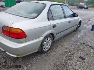 1999 Honda Civic DX with VIN 1HGEJ6628XL028492, listed as a IAAI auction lot 42071358 with 285,769 mi miles. Bid and sale history available at carsss.com. Image 12.