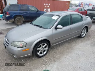 2002 Nissan Maxima GLE z VIN JN1DA31A12T000651, wystawiony jako IAAI lot #42167202 z przebiegiem Nie podano mil oraz . Historia ofert i sprzedaży dostępna na DreamBid. Obrazek 2.