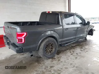 2020 Ford F-150 XL with VIN 1FTEW1EPXLKE25671, listed as a IAAI auction lot 41641393 with 63,398 mi miles and . Bid and sale history available at DreamBid. Image 4.