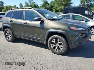 2015 Jeep Cherokee Trailhawk with VIN 1C4PJMBS8FW513391, listed as a Copart auction lot 64633115 with 115,406 mi miles and Clean title. Bid and sale history available at DreamBid. Image 4.