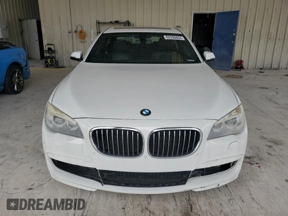 2013 BMW 7 Series 740i with VIN WBAYA6C5XDD143639, listed as a Copart auction lot 62296694 with 97,082 mi miles and Salvage Title. Bid and sale history available at carsss.com. Image 5.