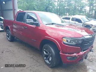 2023 Ram 1500 Limited with VIN 1C6SRFHM2PN509939, listed as a IAAI auction lot 42514018 with 31,669 mi miles and . Bid and sale history available at DreamBid. Image 1.