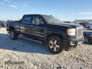 2015 GMC Sierra 2500HD Denali z VIN 1GT120E89FF153186, wystawiony jako Copart lot #88546105 z przebiegiem 418 972 mil mil oraz Czysty tytuł • Clean title. Historia ofert i sprzedaży dostępna na DreamBid. Obrazek 4.