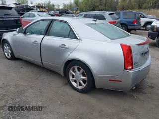 2008 Cadillac CTS AWD w/1SB with VIN 1G6DT57VX80174891, listed as a IAAI auction lot 39161303 with 116,089 mi miles. Bid and sale history available at carsss.com. Image 3.
