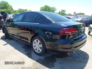 2017 Volkswagen Jetta S with VIN 3VW2B7AJ1HM329900, listed as a IAAI auction lot 42213125 with 124,556 mi miles and . Bid and sale history available at DreamBid. Image 3.