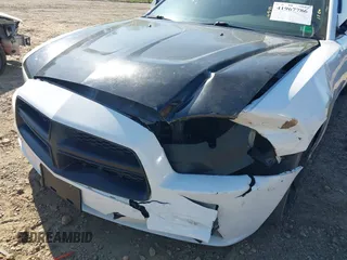 2013 Dodge Charger SE with VIN 2C3CDXBG8DH622498, listed as a IAAI auction lot 41967786 with 143,514 mi miles. Bid and sale history available at carsss.com. Image 6.