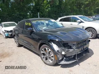 2023 Ford Mustang Mach-E Premium z VIN 3FMTK3SU2PMA83720, wystawiony jako IAAI lot #42697799 z przebiegiem 38 277 mil mil oraz . Historia ofert i sprzedaży dostępna na DreamBid. Obrazek 1.