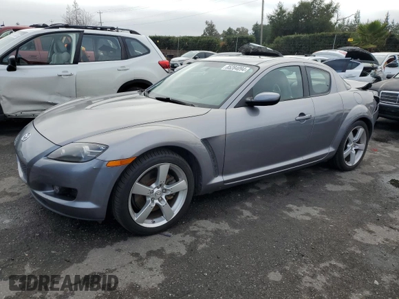 2004 Mazda RX-8 with VIN JM1FE17N740117681, listed as a Copart auction lot 85284094 with 138,555 mi miles and Salvage Title. Bid and sale history available at DreamBid. Image 1.