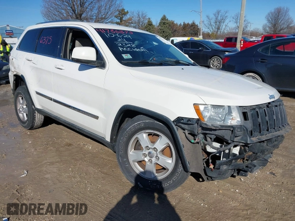 2012 Jeep Grand Cherokee Laredo with VIN 1C4RJFAGXCC224138, listed as a IAAI auction lot 41736375 with 133,383 mi miles. Bid and sale history available at carsss.com. Image 1.