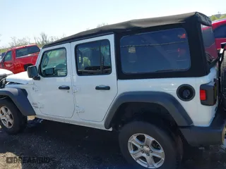 2020 Jeep Wrangler Unlimited Sport Altitude with VIN 1C4HJXDG7LW212475, listed as a IAAI auction lot 41990654 with 53,079 mi miles. Bid and sale history available at carsss.com. Image 14.