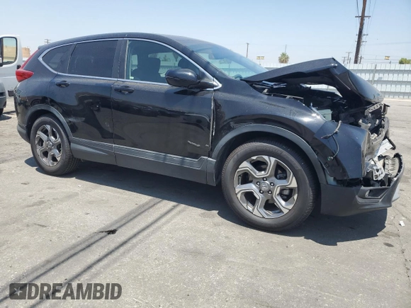 2019 Honda CR-V EX with VIN 5J6RW1H55KA047950, listed as a Copart auction lot 61030775 with 69,817 mi miles and Salvage title. Bid and sale history available at DreamBid. Image 4.