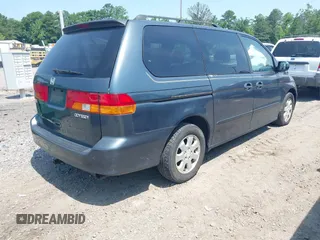 2004 Honda Odyssey EX-L with VIN 5FNRL18964B069905, listed as a IAAI auction lot 42583728 with 217,237 mi miles and . Bid and sale history available at DreamBid. Image 4.