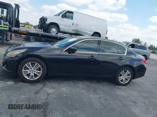 2013 Infiniti G37 Sedan Journey with VIN JN1CV6AP9DM711338, listed as a IAAI auction lot 42113221 with 153,049 mi miles. Bid and sale history available at carsss.com. Image 15.