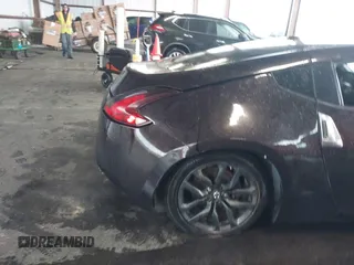 2016 Nissan 370Z with VIN JN1AZ4EHXGM935516, listed as a IAAI auction lot 41966014 with 92,147 mi miles. Bid and sale history available at carsss.com. Image 6.