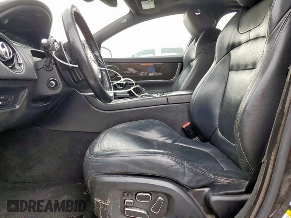 2015 Jaguar XJ with VIN SAJWA1CZ8F8V85381, listed as a Copart auction lot 57464225 with 161,938 mi miles and Salvage Title. Bid and sale history available at DreamBid. Image 7.