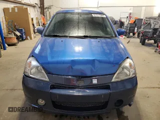 2005 Suzuki Aerio SX z VIN JS2RC61H455303174, wystawiony jako Copart lot #87417584 z przebiegiem 263 530 mil mil oraz Szkoda całkowita • Salvage title. Historia ofert i sprzedaży dostępna na DreamBid. Obrazek 5.