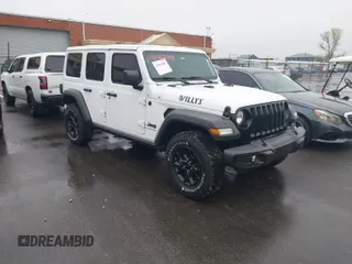 2023 Jeep Wrangler Sport with VIN 1C4HJXDN8PW523532, listed as a IAAI auction lot 41962483 with 14,643 mi miles and . Bid and sale history available at DreamBid. Image 1.