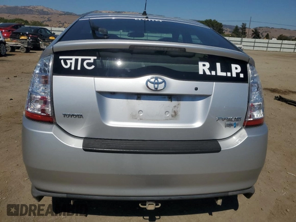 2007 Toyota Prius with VIN JTDKB20U577684420, listed as a Copart auction lot 65756845 with 127,323 mi miles and Salvage title. Bid and sale history available at DreamBid. Image 6.