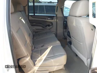 2018 Chevrolet Suburban LT with VIN 1GNSCHKC8JR358781, listed as a IAAI auction lot 40474820 with Not Provided miles and . Bid and sale history available at DreamBid. Image 8.