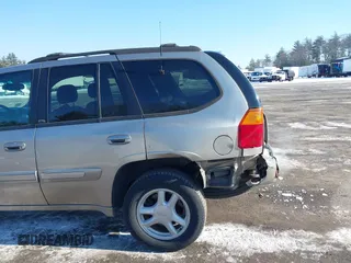 2002 GMC Envoy SLT with VIN 1GKDT13S822154592, listed as a IAAI auction lot 41389285 with 153,897 mi miles. Bid and sale history available at carsss.com. Image 12.