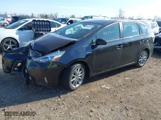 2016 Toyota Prius v Two with VIN JTDZN3EU9GJ043181, listed as a IAAI auction lot 41893645 with 135,895 mi miles. Bid and sale history available at carsss.com. Image 2.