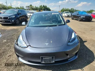 2023 Tesla Model 3 с VIN 5YJ3E1EAXPF594565, выставлен на аукционе Copart как лот 65361925 с пробегом Не указан миль и Списание • Salvage title. История ставок и продаж доступна на DreamBid. Изображение 5.