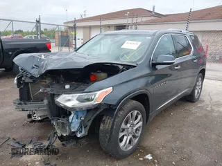 2018 Chevrolet Traverse Premier z VIN 1GNEVJKW4JJ240024, wystawiony jako IAAI lot #42369659 z przebiegiem 160 147 mil mil oraz . Historia ofert i sprzedaży dostępna na DreamBid. Obrazek 6.
