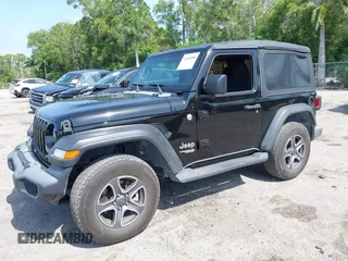 2019 Jeep Wrangler Sport S with VIN 1C4GJXAG2KW664395, listed as a IAAI auction lot 42683888 with 72,742 mi miles and . Bid and sale history available at DreamBid. Image 17.