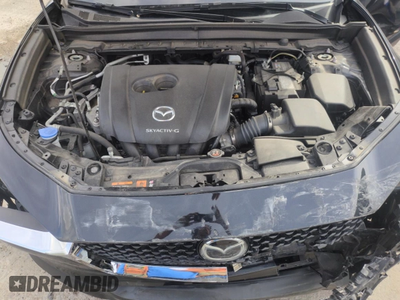 2021 Mazda CX-30 Select z VIN 3MVDMBBL4MM317712, wystawiony jako Copart lot #56322775 z przebiegiem 31 962 mil mil oraz Szkoda całkowita • Salvage title. Historia ofert i sprzedaży dostępna na DreamBid. Obrazek 12.