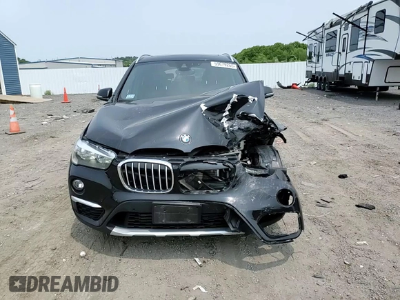 2018 BMW X1 xDrive28i with VIN WBXHT3C36J3H29952, listed as a Copart auction lot 59679285 with 75,220 mi miles and Salvage title. Bid and sale history available at DreamBid. Image 14.