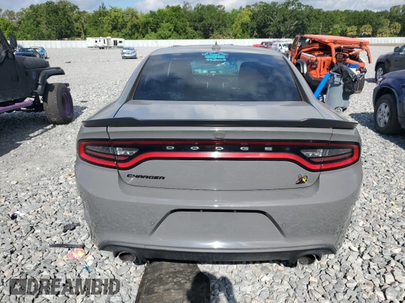 2019 Dodge Charger Scat Pack z VIN 2C3CDXGJ2KH633854, wystawiony jako Copart lot #53296705 z przebiegiem 74 285 mil mil oraz Czysty tytuł • Clean title. Historia ofert i sprzedaży dostępna na DreamBid. Obrazek 6.