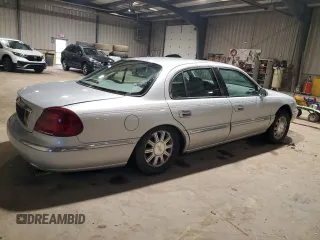 2001 Lincoln Continental with VIN 1LNHM97V51Y698794, listed as a Copart auction lot 47649315 with 84,465 mi miles and Salvage Title. Bid and sale history available at DreamBid. Image 3.